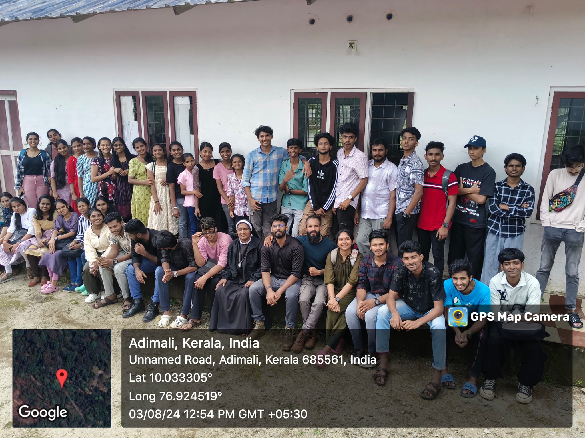 Group of students involved in community service projects organized by Carmelgiri College